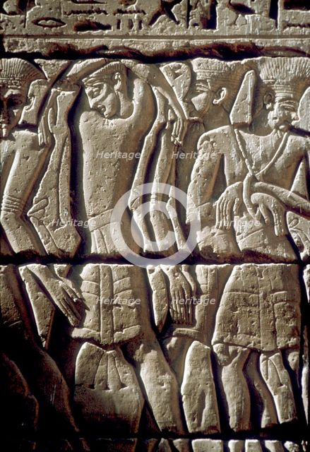 Relief of enemy prisoners, Temple of Rameses III, Medinat Habu, Egypt, c12th century BC. Artist: Unknown