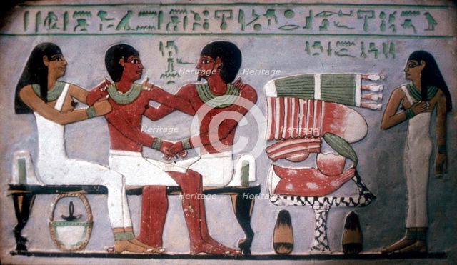 Relief of Imn-Hat seated with his wife & son in front of an offering, Thebes, c2050-c1786 BC. Artist: Unknown