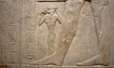Relief of legs of Mereruka with his wife Watetkhethor..., Mastaba of Mereruka, Egypt, 2003. Creator: Unknown