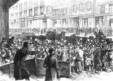 Relief of Paris: the English gift of food - entrance to..Magasin du Bon Marché, rue de Sèvres, 1871. Creator: C. R.