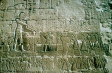 Relief of Rameses III receiving tribute, Mortuary Temple, Medinat Habu, Egypt, c12th centuryBC