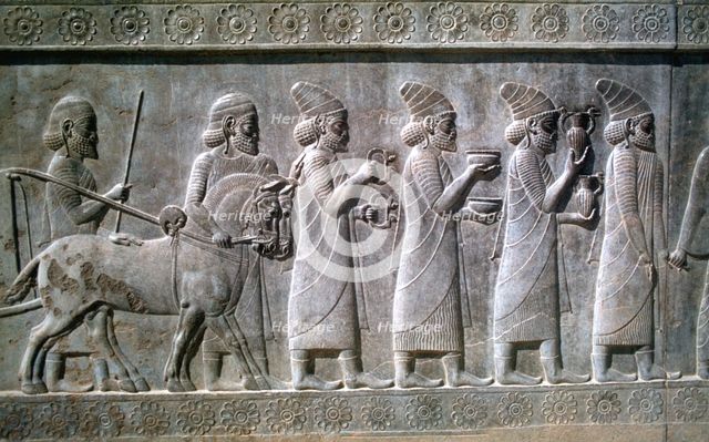Relief of Syrians or Lydians, the Apadana, Persepolis, Iran. Creator: Vivienne Sharp.