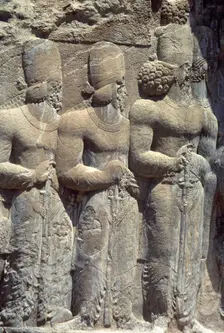 Relief of Shapur's Parade, Sassanian Rock Relief, Naqsh-e Rajab, Fars Province, Iran, (1994). Creator: Unknown