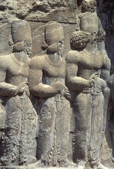 Relief of Shapur's Parade, Sassanian Rock Relief, Naqsh-e Rajab, Fars Province, Iran, (1994). Creator: Unknown