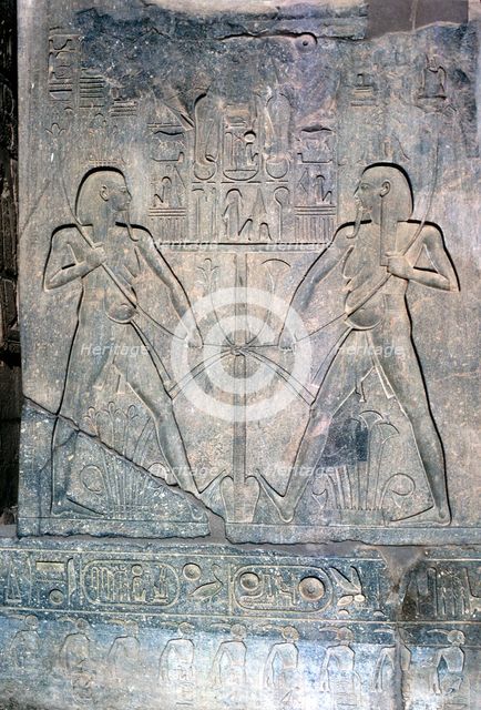 Relief of two figures of Hapy god of the Nile, Temple sacred to Amun Mut & Khons, Luxor, Egypt. Artist: Unknown