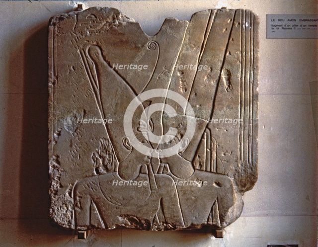 Relief of the god Amun hugging Ramses II, made in stoneware, fragment from Karnak.