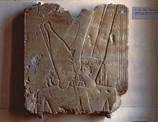 Relief of the god Amun hugging Ramses II, made in stoneware, fragment from Karnak