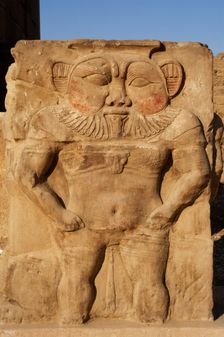 Relief of the god Bes, capital of column, Temple of Hathor, Dendera, Egypt, 2003. Creator: LTL