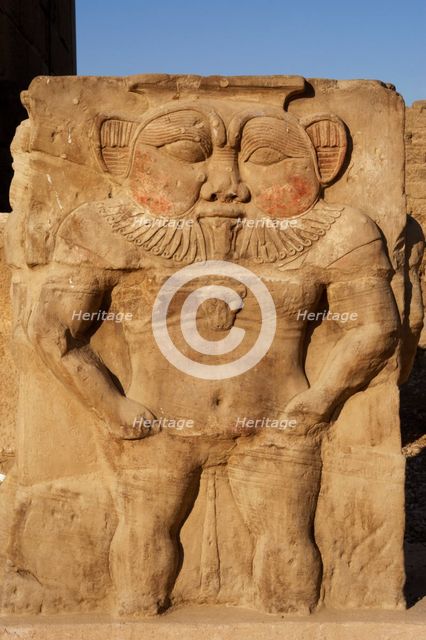 Relief of the god Bes, capital of column, Temple of Hathor, Dendera, Egypt, 2003. Creator: LTL.