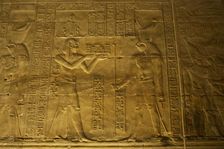 Relief of the Pharaoh making offerings to Horus, Temple of Edfu, Egypt, Ptolemaic period, (2003). Creator: LTL
