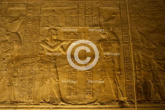 Relief of the Pharaoh making offerings to Horus, Temple of Edfu, Egypt, Ptolemaic period, (2003).  Creator: LTL.