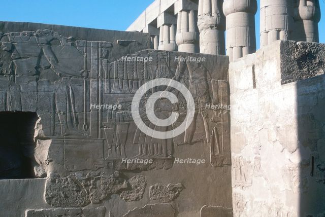 Relief of the Pharaoh smiting his enemies, Temple sacred to Amun, Mut and Khons, Luxor, Egypt. Artist: Unknown