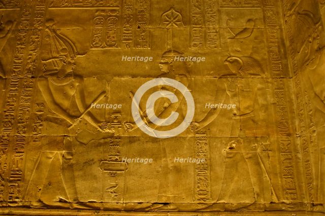 Relief of the Pharaoh with Seshat and Horus, Temple of Edfu, Egypt, Ptolemaic period, (2003). Creator: LTL.