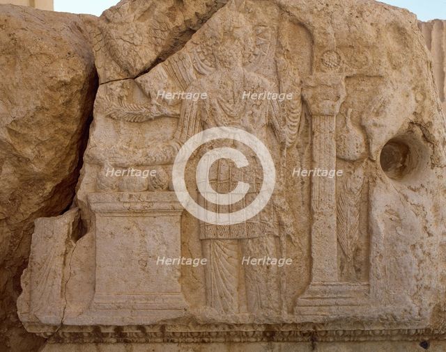 Relief depicting the god Aglibol, Temple of Bel, Palmyra, Syria, 2002.  Creator: LTL.