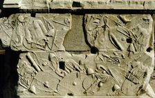 Relief depicting Roman shields and armour