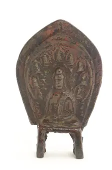 Relief statuette of seated Buddha with nine miniature Buddhas..., Period of Division, 5th century. Creator: Unknown