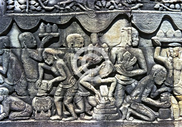 Relief showing an everyday scene in the temples of Angkor Thom in Cambodia.