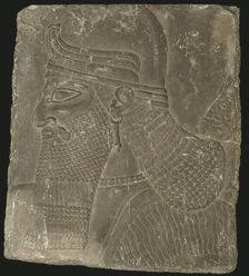Relief Showing the Head of a Winged Genius, Neo-Assyrian Period, reign of Ashurnasirpal II (883-859 Creator: Unknown