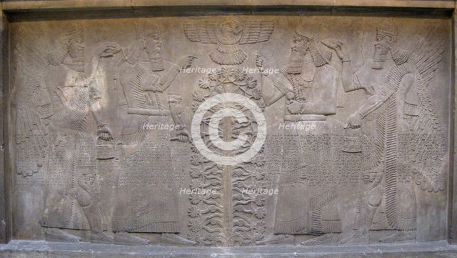 Relief with two figures of Ashurnasirpal, winged mythological beings and the god Ashur, before the Tree of Life, 885-860 BC. Artist: Assyrian Art  