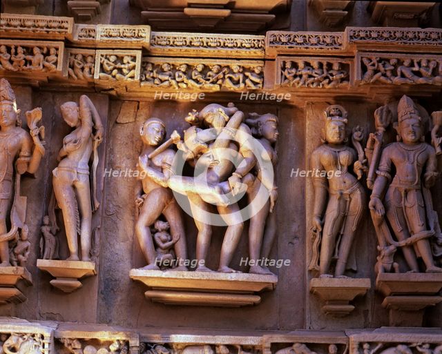 Reliefs with erotic scenes in the Lakshmana Temple, Kajuraho, India..