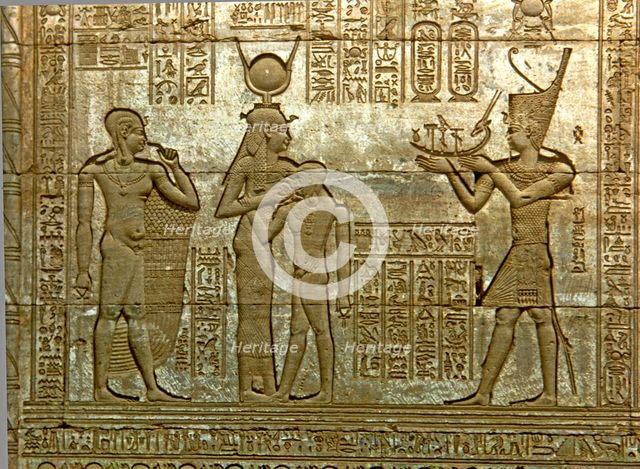 Reliefs with figures and writing in the Temple of Hathor.