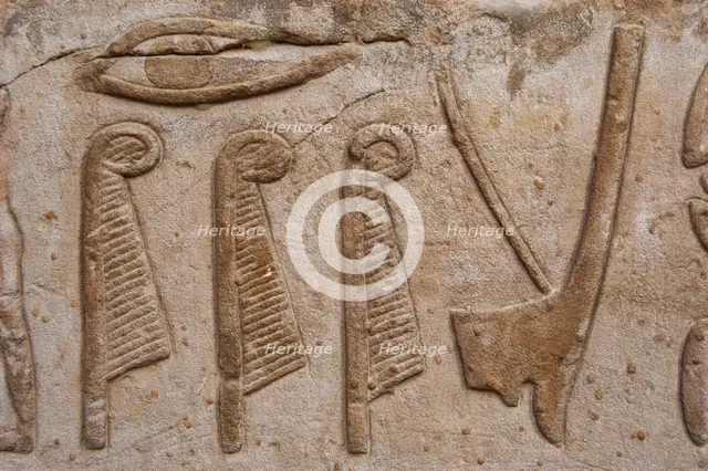 Reliefs depicting hieroglyphic signs, ostrich feathers and crown of...Temple of Edfu, Egypt...(2003) Creator: LTL.
