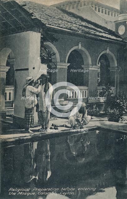'Religious Preparation before entering the Mosque, Colombo, Ceylon', c1910.  Artist: Unknown.