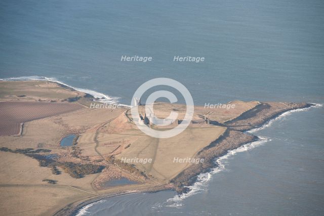 Remains of the 14th century Dunstanburgh Castle, Northumberland, 2015. Creator: Historic England.