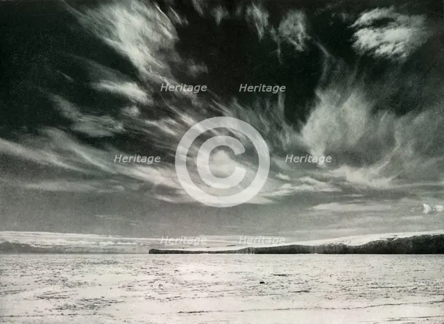 'Remarkable Cirrus Clouds Over The Barne Glacier', 19 Dec 1911, (1913). Artist: Herbert Ponting.
