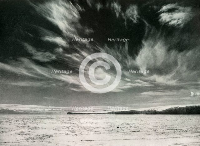 'Remarkable Cirrus Clouds Over The Barne Glacier', 19 Dec 1911, (1913). Artist: Herbert Ponting.