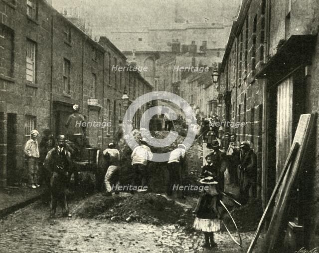 'Removing Debris Brought Down By A Flood At St. Ives', 1901. Creator: Unknown.
