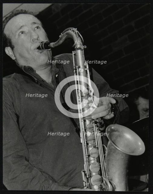 Renato D'Aiello playing tenor saxophone at The Fairway, Welwyn Garden City, Hertfordshire, 2004. Creator: Denis Williams.