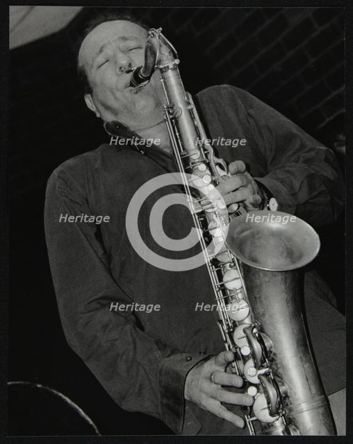 Renato D'Aiello playing tenor saxophone at The Fairway, Welwyn Garden City, Hertfordshire, 2004. Creator: Denis Williams.