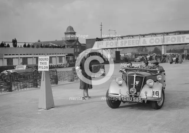 Renault open tourer competing in the JCC Rally, Brooklands, Surrey, 1939. Artist: Bill Brunell.