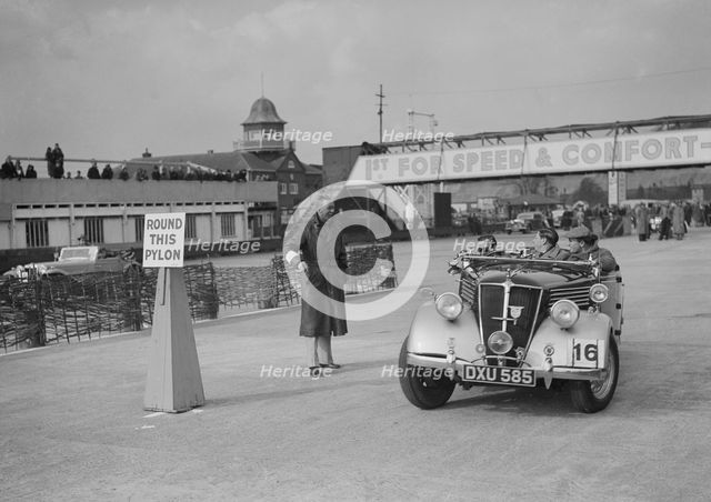Renault open tourer competing in the JCC Rally, Brooklands, Surrey, 1939. Artist: Bill Brunell.