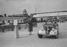 Renault open tourer competing in the JCC Rally, Brooklands, Surrey, 1939. Artist: Bill Brunell