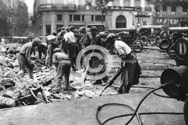 Renewing the roads on the Grands Boulevards, Paris, 1931.Artist: Ernest Flammarion