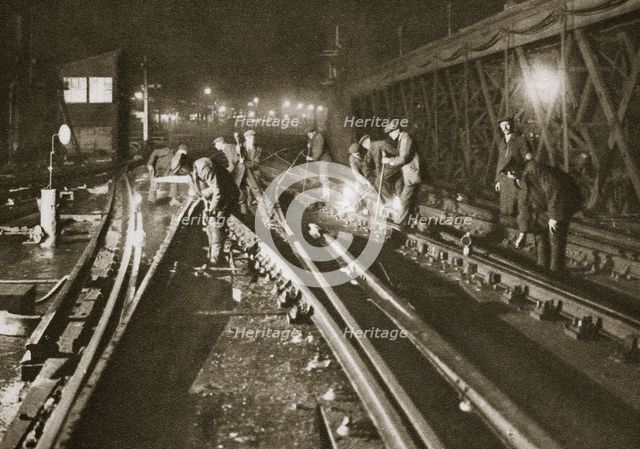 Repairing a railway track, Charing Cross Bridge, London, 20th century. Creator: Unknown.
