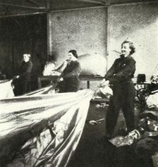 Repairing Barrage Balloons c1943. Creator: Cecil Beaton