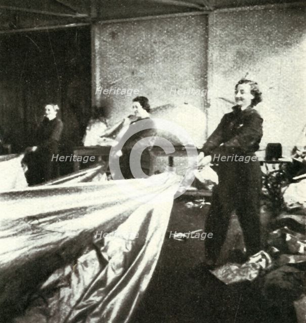 'Repairing Barrage Balloons', c1943. Creator: Cecil Beaton.
