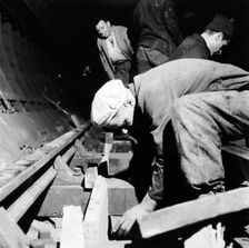 Repairing underground train tracks, London, 1955. Creator: Henry Grant