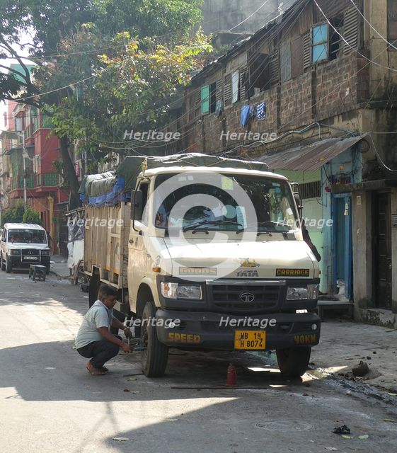 Repairs to TATA truck , West Bengal India, 2019. Creator: Unknown.