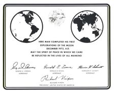 Replica of the plaque left on the Moon by Apollo 17 astronauts, 1972. Creator: NASA
