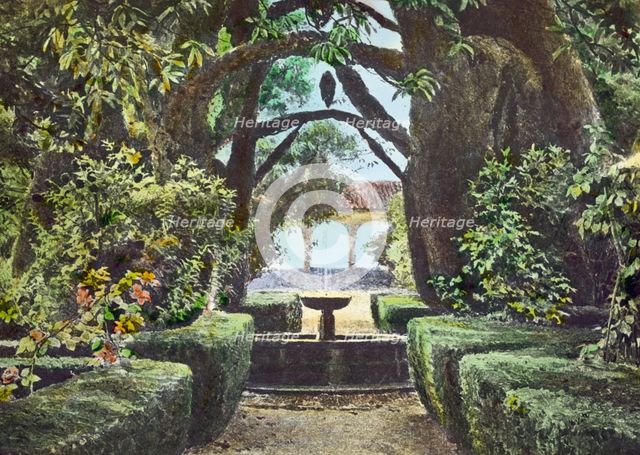 Reproduction of illustration showing a garden fountain, between 1915 and 1925. Creator: Frances Benjamin Johnston.