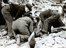 Rescue scene after a German night air raid on London, World War II, 22 March 1944. Creator: Unknown