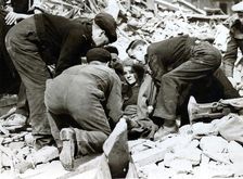 Rescue scene after a German night air raid on London, World War II, 22 March 1944