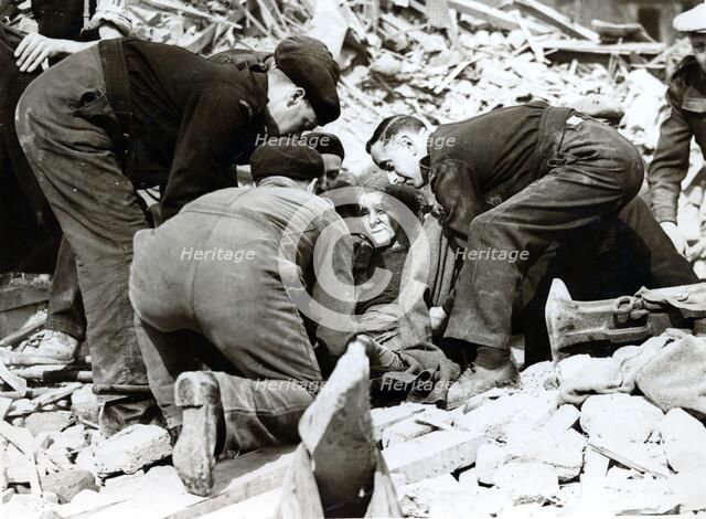 Rescue scene after a German night air raid on London, World War II, 22 March 1944. Artist: Unknown