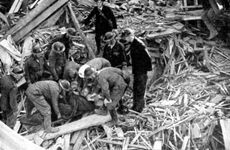 Rescue workers releasing a man from a bomb damaged building, World War II, 1940. Artist: Unknown