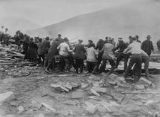 Rescuers at Austin pulling down ruins, between c1910 and c1915. Creator: Bain News Service