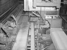 Resident of Longview Homesteads in sawmill, Longview, Washington, 1936. Creator: Dorothea Lange